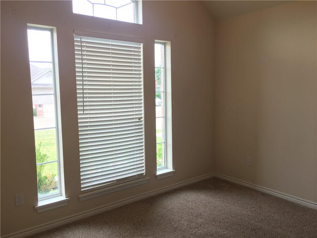 2218 Old Ironsides Road Abilene, TX 79601 - Photo 10 of 26 a view of an empty room and a window