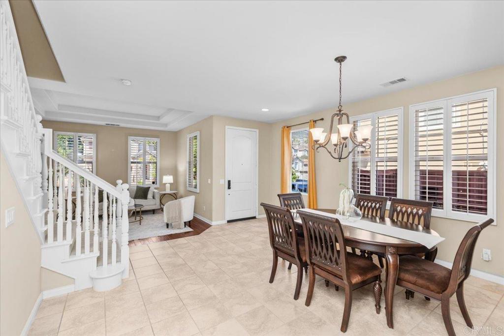838 Luminara Way San Marcos, CA 92078 - Photo 20 of 54 a view of a dining room with furniture window and outside view