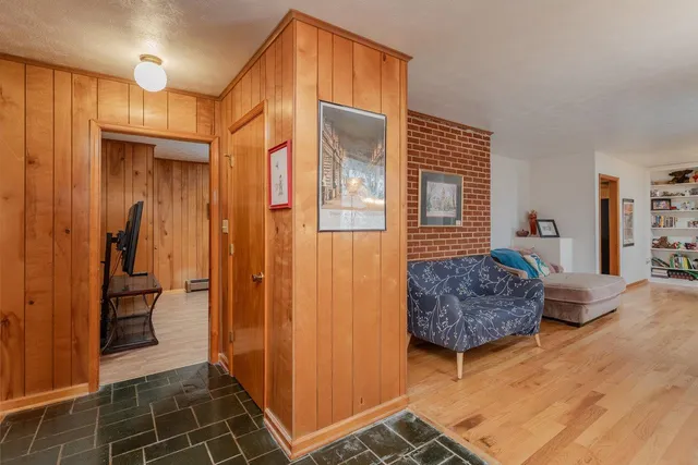 a living room with furniture and a rug
