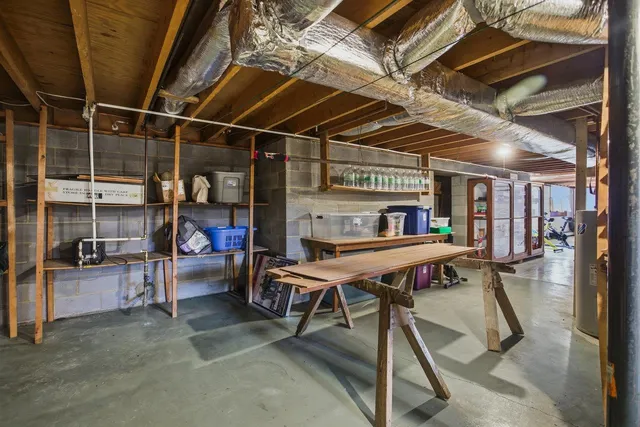 a patio with a table and chairs