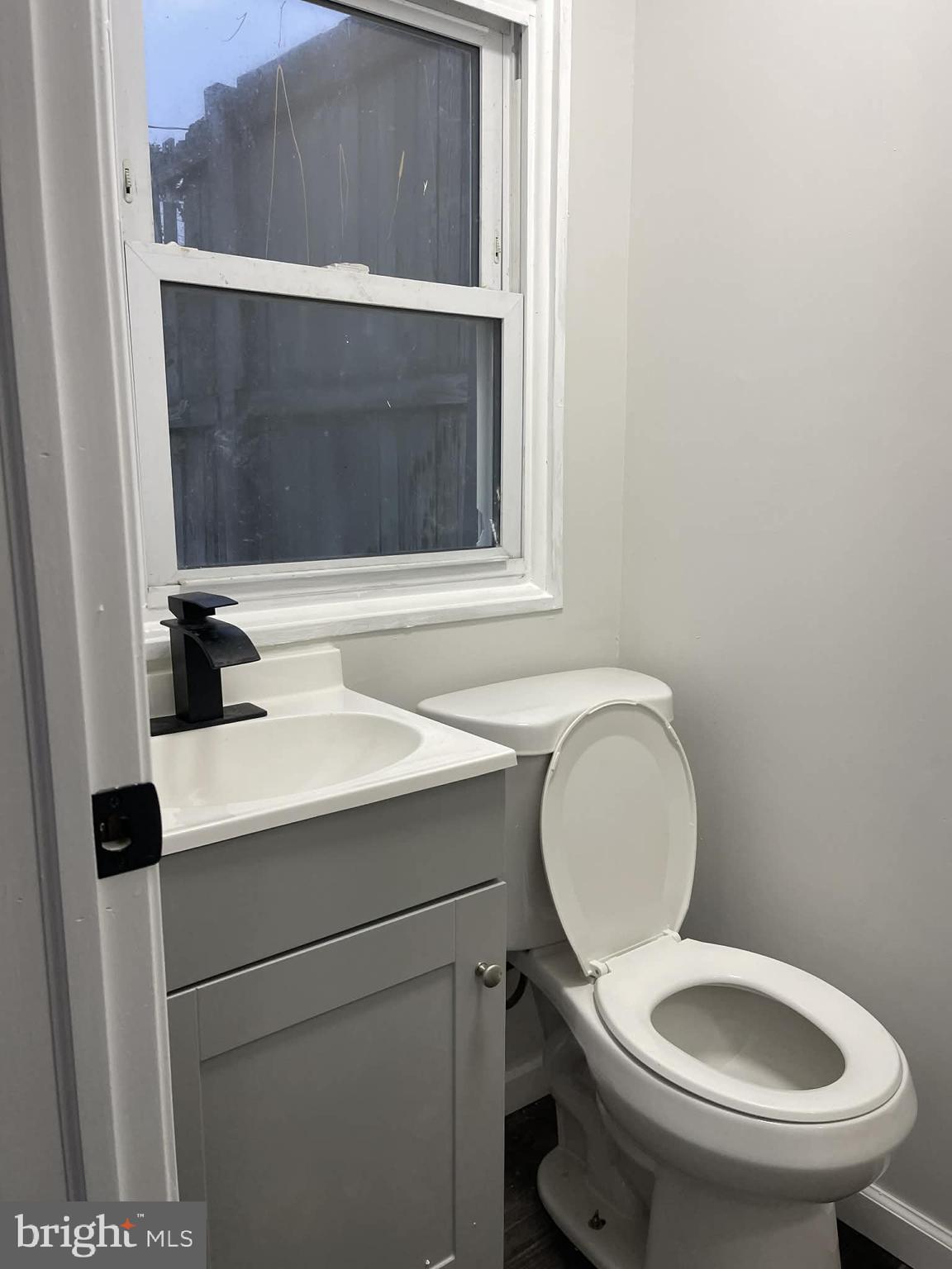 124 Pear Street Reading, PA 19601 - Photo 7 of 19 a bathroom with a toilet and a sink