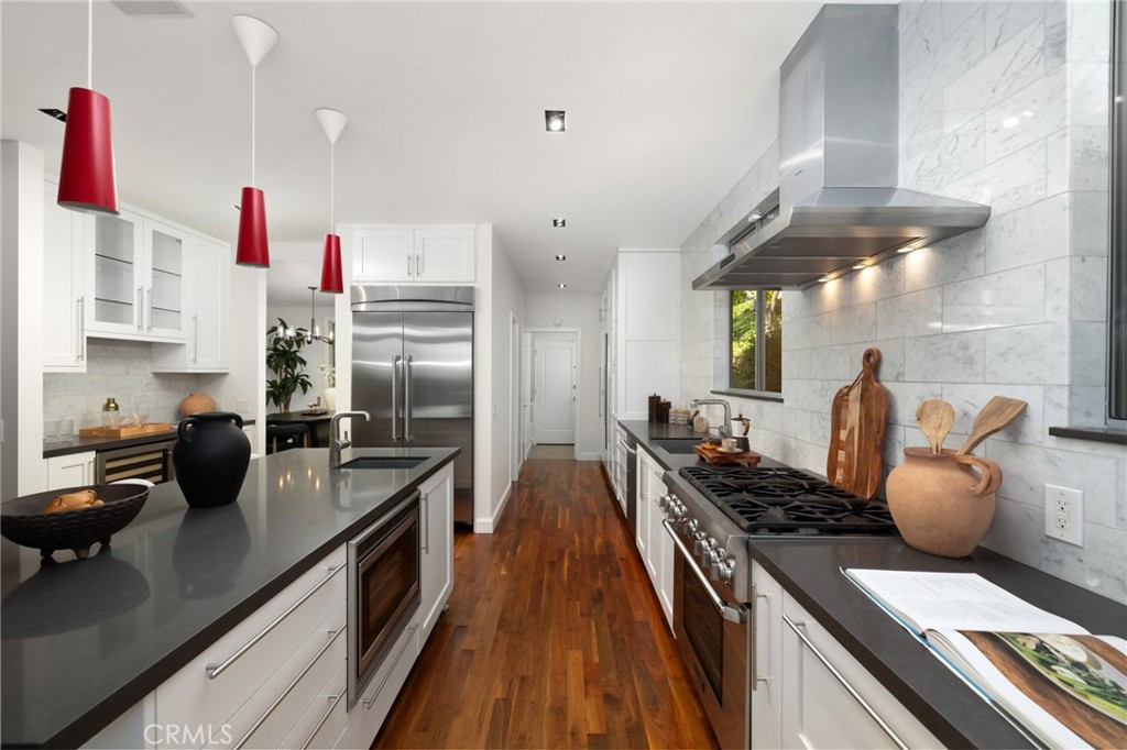 598 Camillo Road Sierra Madre, CA 91024 - Photo 23 of 75 a kitchen with stainless steel appliances a sink and a stove