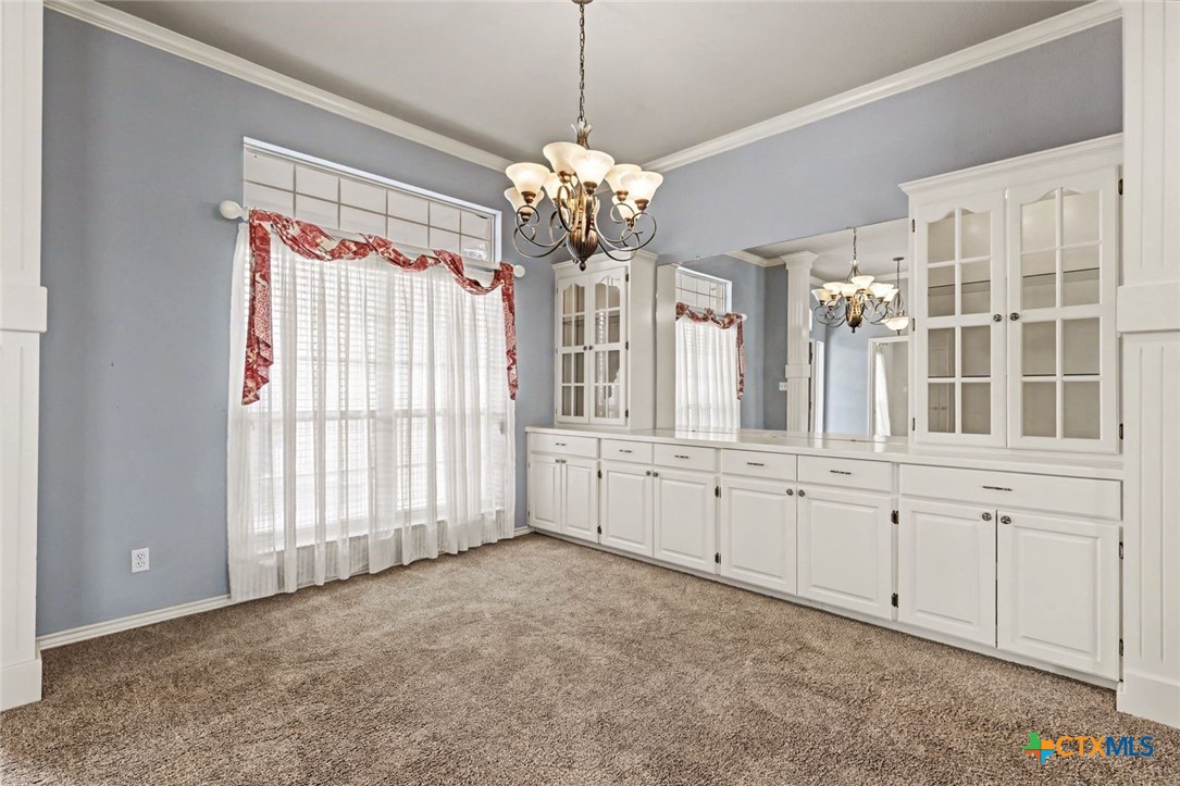 307 West Main Street Stockdale, TX 78160 - Photo 12 of 36 a view of a kitchen with granite countertop cabinets and window