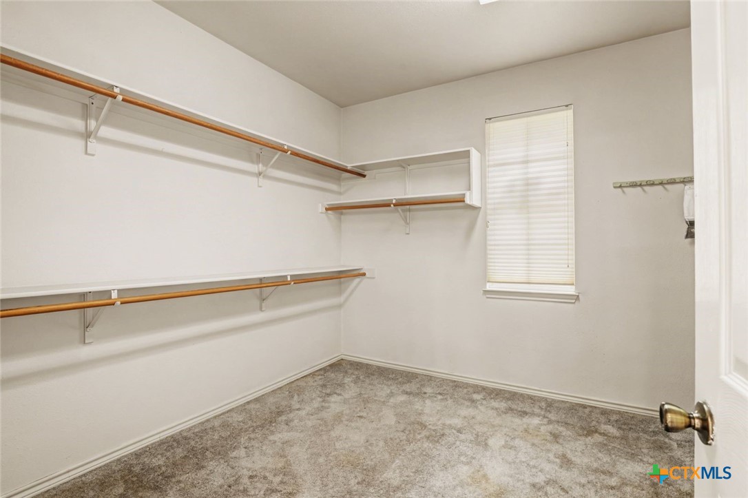 307 West Main Street Stockdale, TX 78160 - Photo 23 of 36 a view of a room with racks on the wall