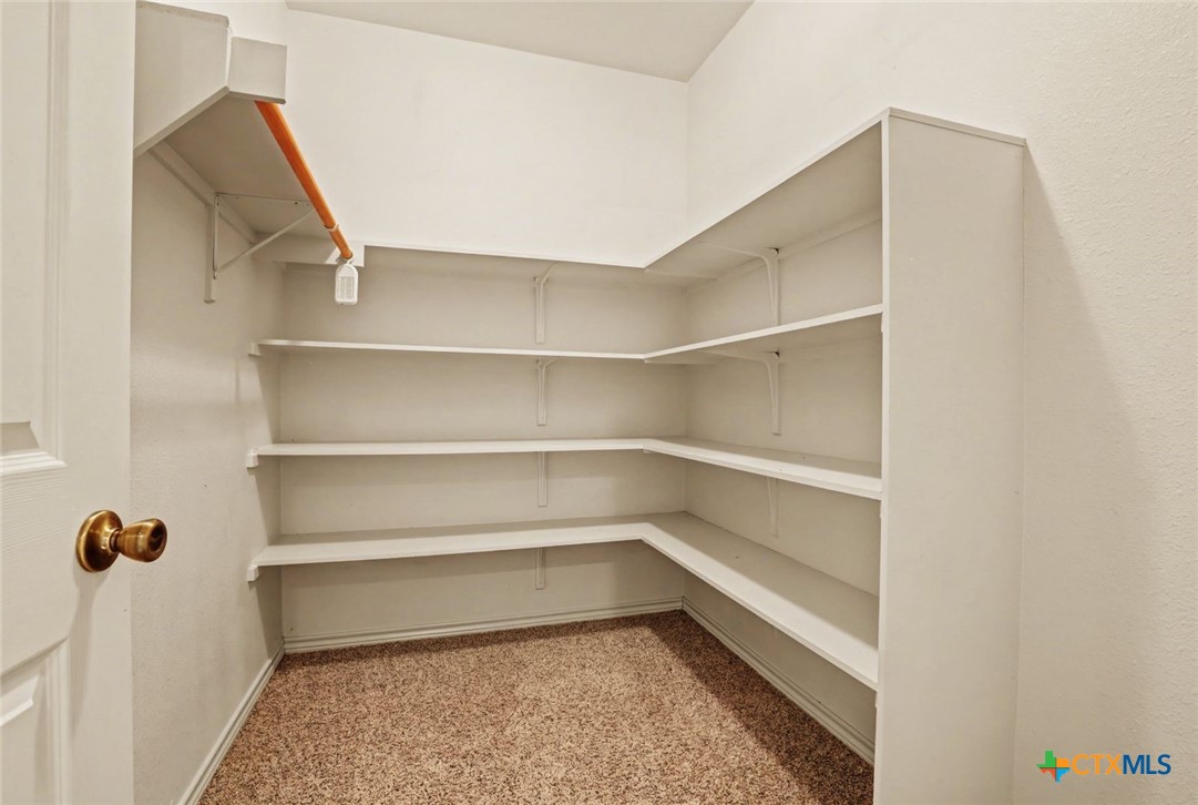 307 West Main Street Stockdale, TX 78160 - Photo 33 of 36 a view of a room with shelves