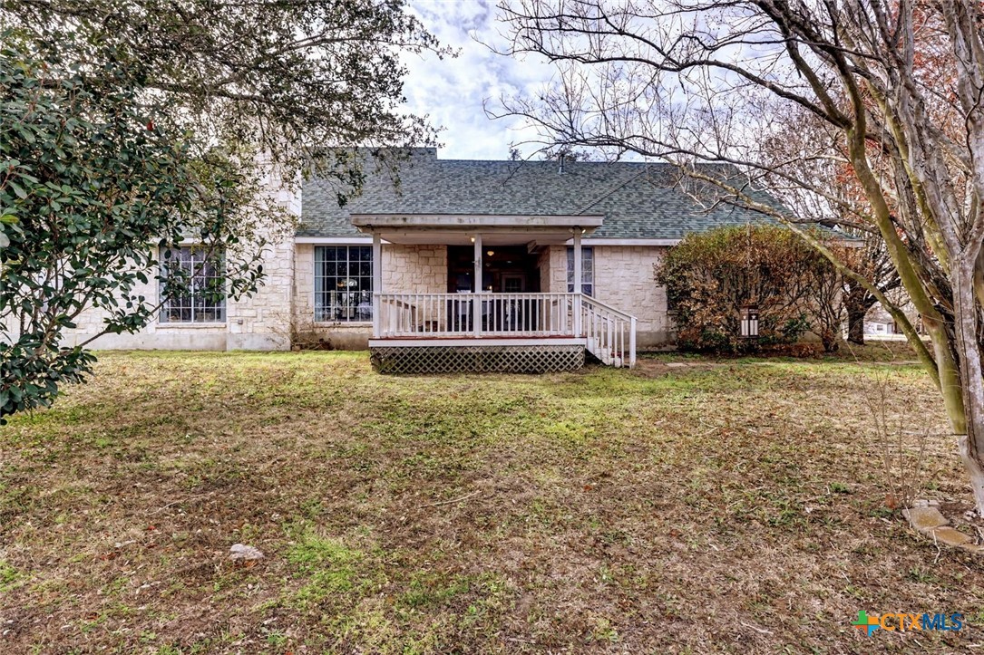 307 West Main Street Stockdale, TX 78160 - Photo 5 of 36 a front view of a house with garden