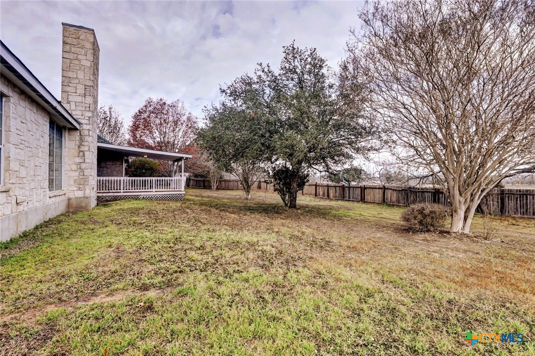 307 West Main Street Stockdale, TX 78160 - Photo 7 of 36 a front view of a house with a yard