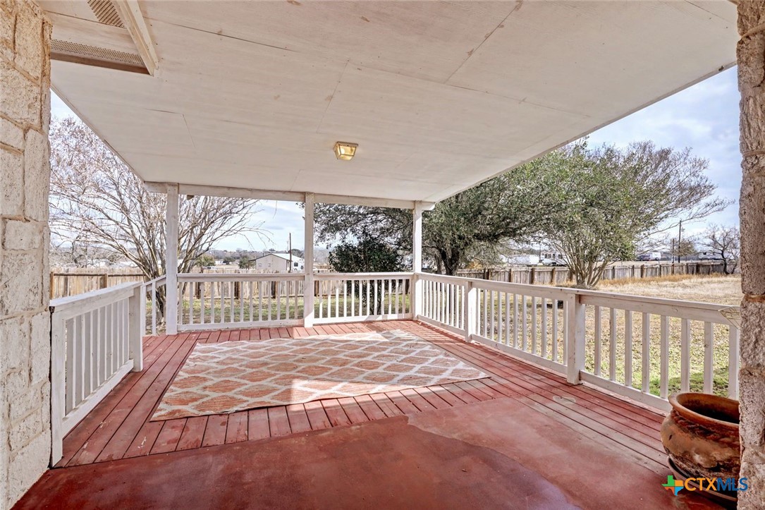 307 West Main Street Stockdale, TX 78160 - Photo 10 of 36 a view of a porch with a yard