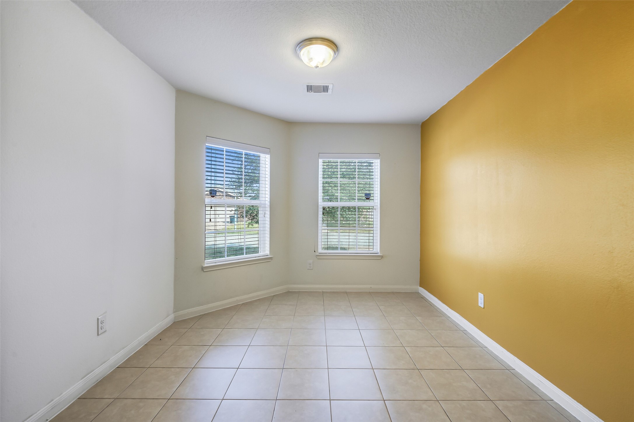 22719 Tabberts Way Hockley, TX 77447 - Photo 11 of 28 a view of an empty room with a window