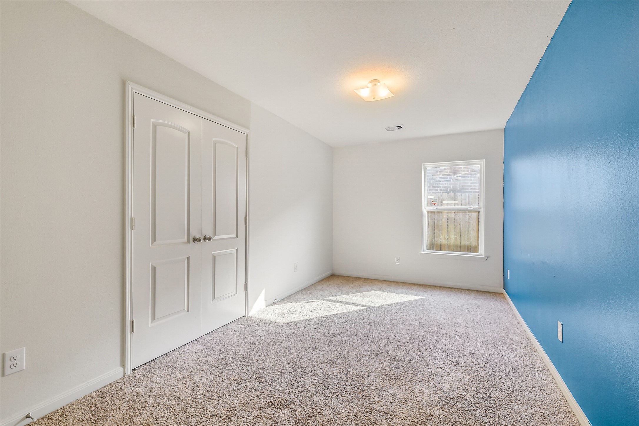 22719 Tabberts Way Hockley, TX 77447 - Photo 12 of 28 an empty room with windows