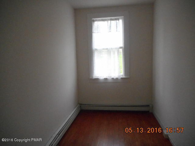 233 Perkins Pond Road Beach Lake, PA 18405 - Photo 12 of 20 a view of an empty room with a window