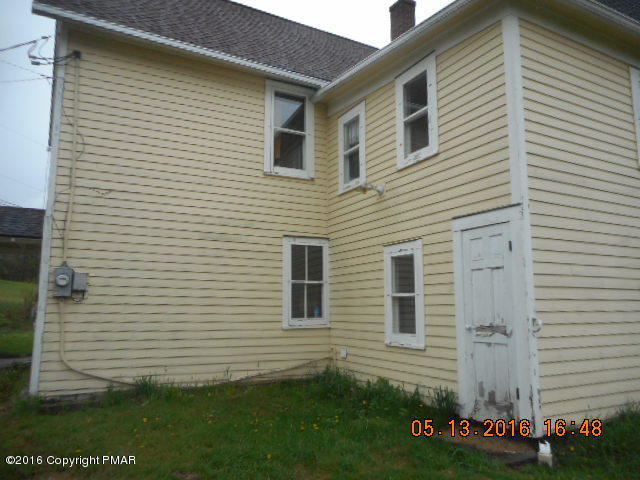 233 Perkins Pond Road Beach Lake, PA 18405 - Photo 10 of 20 a view of a house with a yard