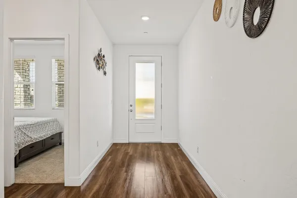 a view of entryway with wooden floor