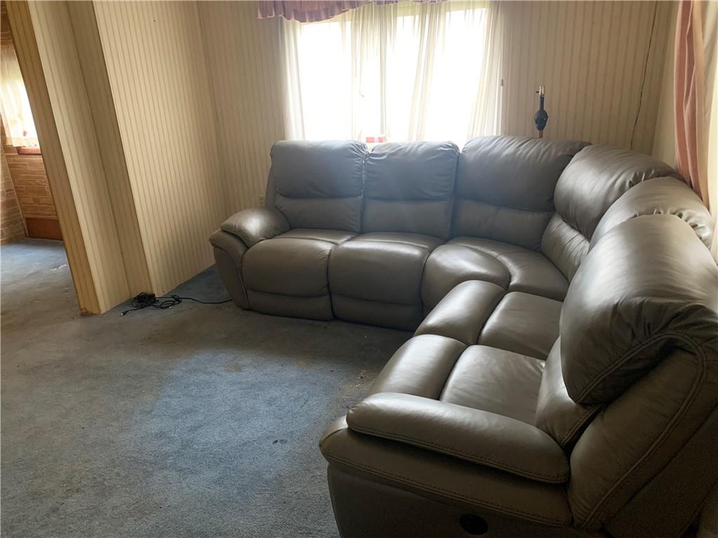 232 Wendel Road Irwin, PA 15642 - Photo 5 of 20 a living room with furniture and a couch