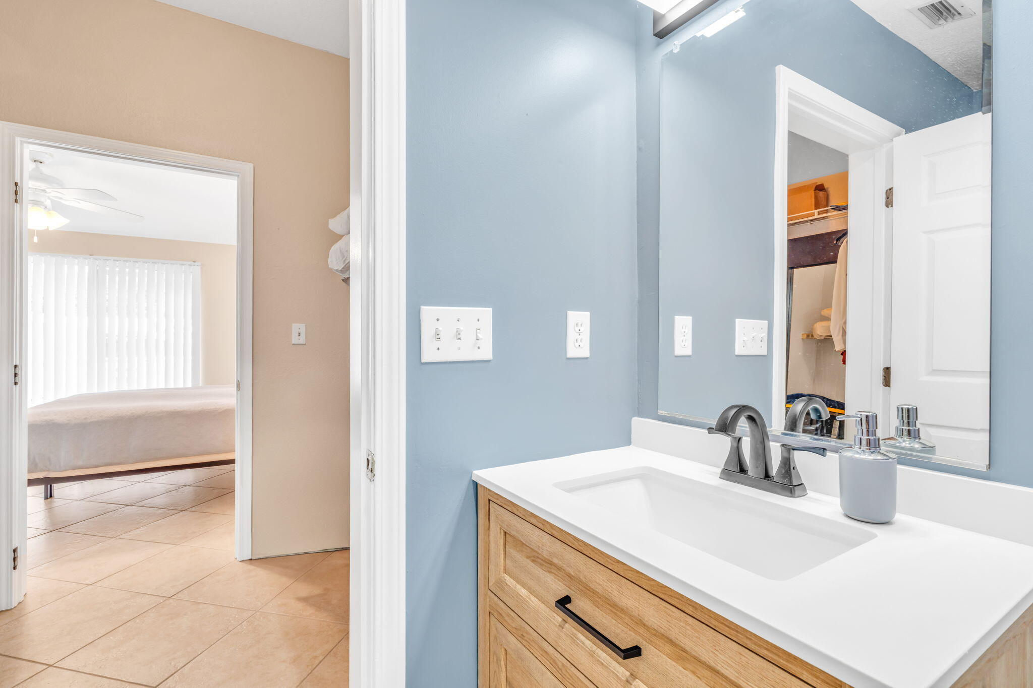 57485 Gibson Street Marathon, FL 33050 - Photo 29 of 33 a bathroom with a sink and a mirror