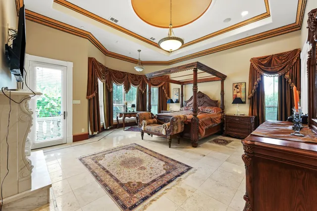 a spacious bathroom with a double vanity sink a mirror and a bathtub