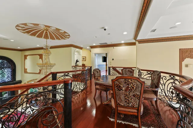 a living room with furniture fireplace and a flat screen tv