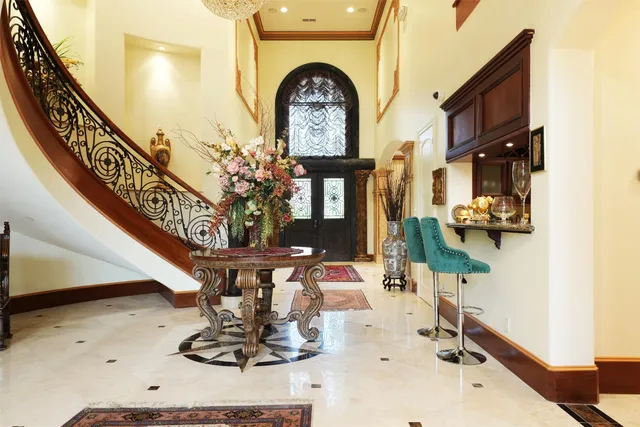 a kitchen with granite countertop a sink and a stove