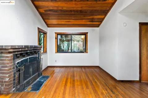 a view of livingroom with furniture and floor to ceiling window