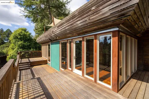 a kitchen with stainless steel appliances a stove sink and cabinets