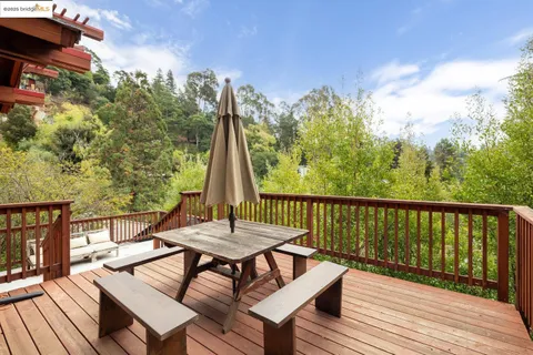 a view of a chairs on the roof deck
