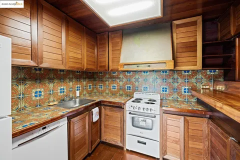 a bathroom with a bathtub and a window