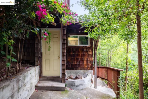 a view of a porch with furniture