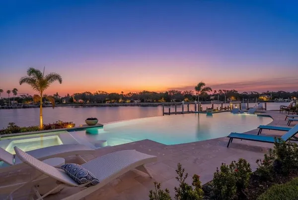 a living room with fireplace furniture and a flat screen tv