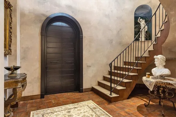 a kitchen with a counter space a sink appliances and cabinets