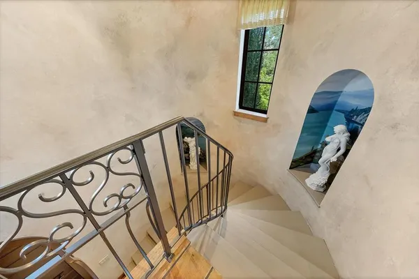 a view of balcony with furniture