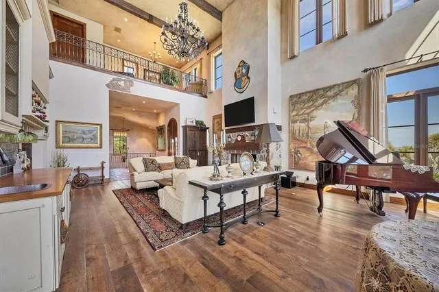 a bathroom with a granite countertop sink a mirror and shower