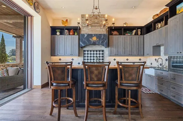 a view of a lake with houses in the back