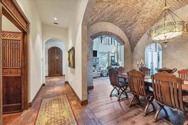 a view of an chairs and table in the balcony