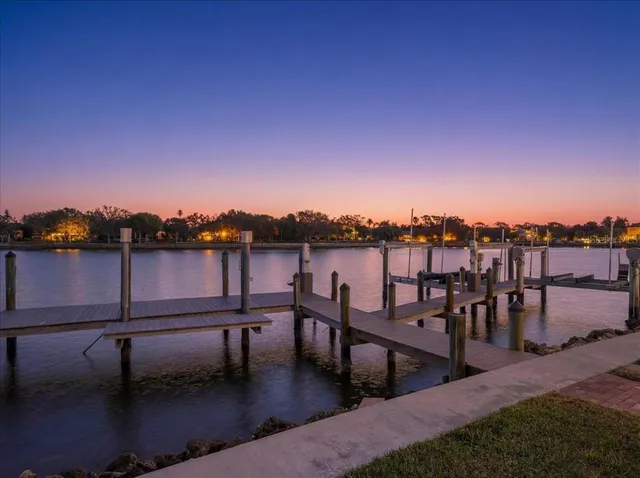 a living room with fireplace furniture and a flat screen tv