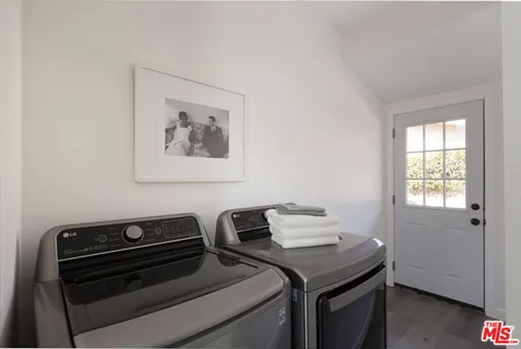 a view of a workspace with furniture