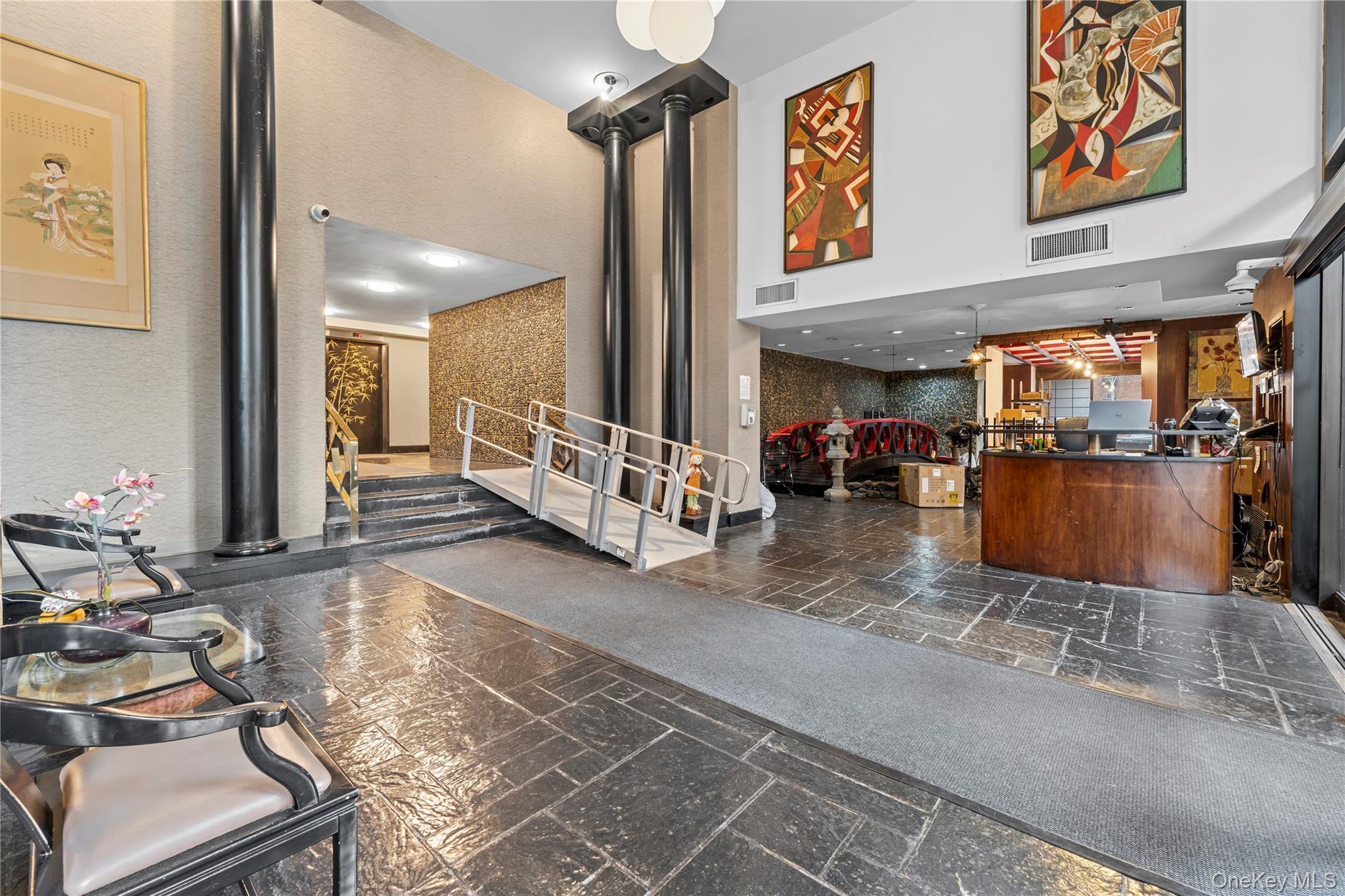 102-10 66th Road, Unit 3B Queens, NY 11375 - Photo 20 of 26 a living room with furniture and a flat screen tv