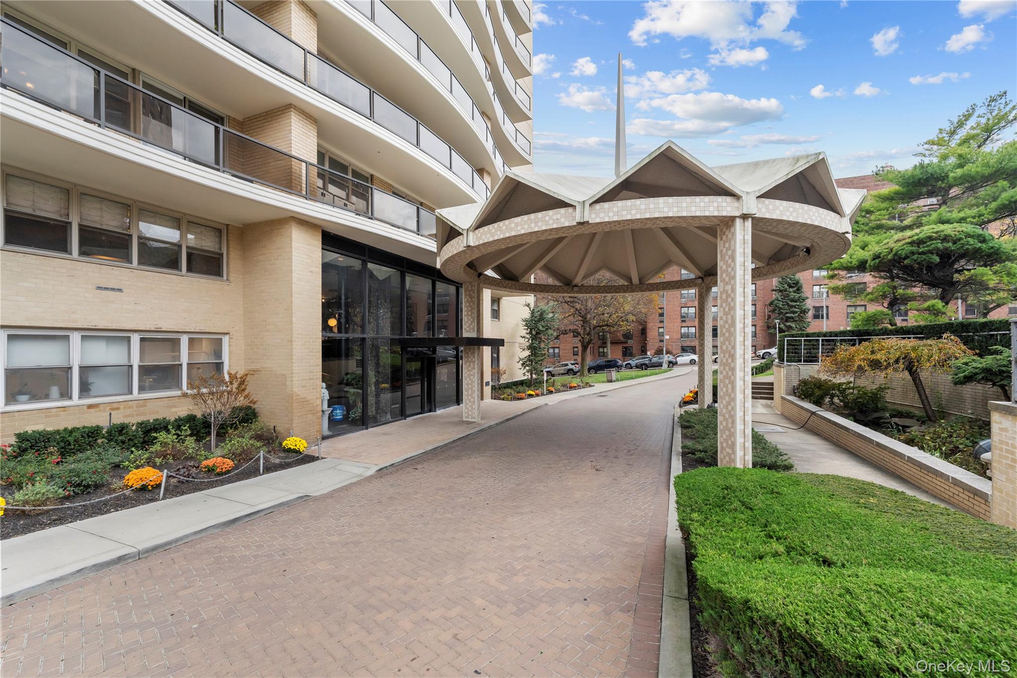 102-10 66th Road, Unit 3B Queens, NY 11375 - Photo 21 of 26 a view of a street with potted plants