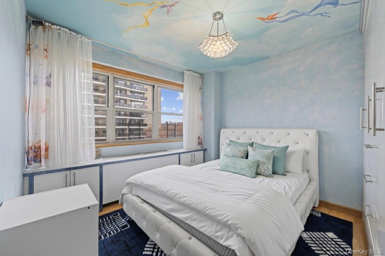 102-10 66th Road, Unit 3B Queens, NY 11375 - Photo 7 of 26 a bedroom with a bed and a window