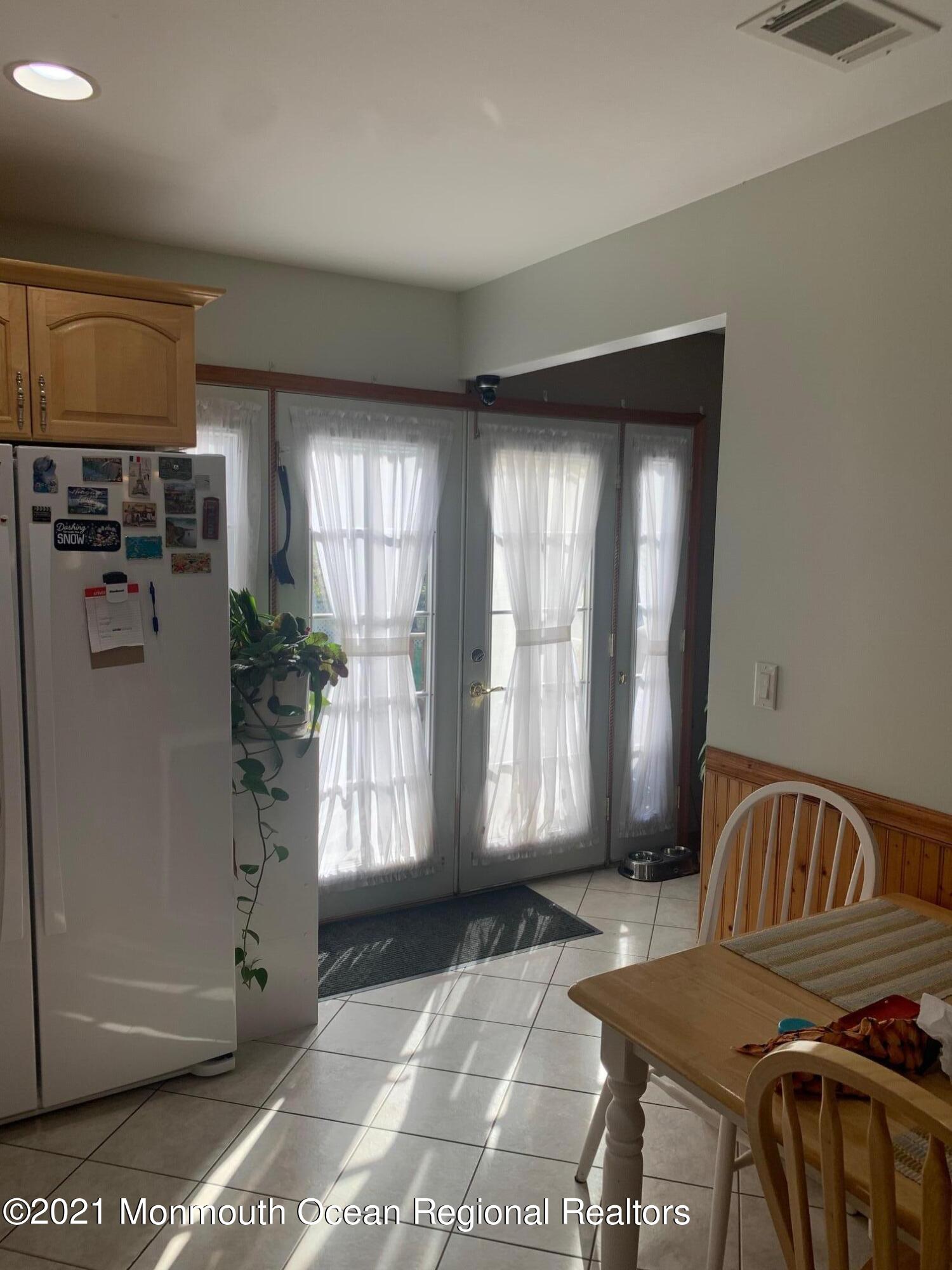 3 Gordons Corner Road Englishtown, NJ 07726 - Photo 7 of 18 Kitchen Doors to Backyard