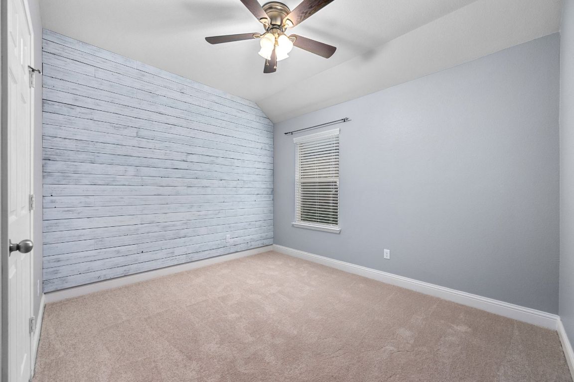 2041 Elaina Loop Leander, TX 78641 - Photo 18 of 25 The secondary rooms could easily be configured for guests, hobbies, or an office.