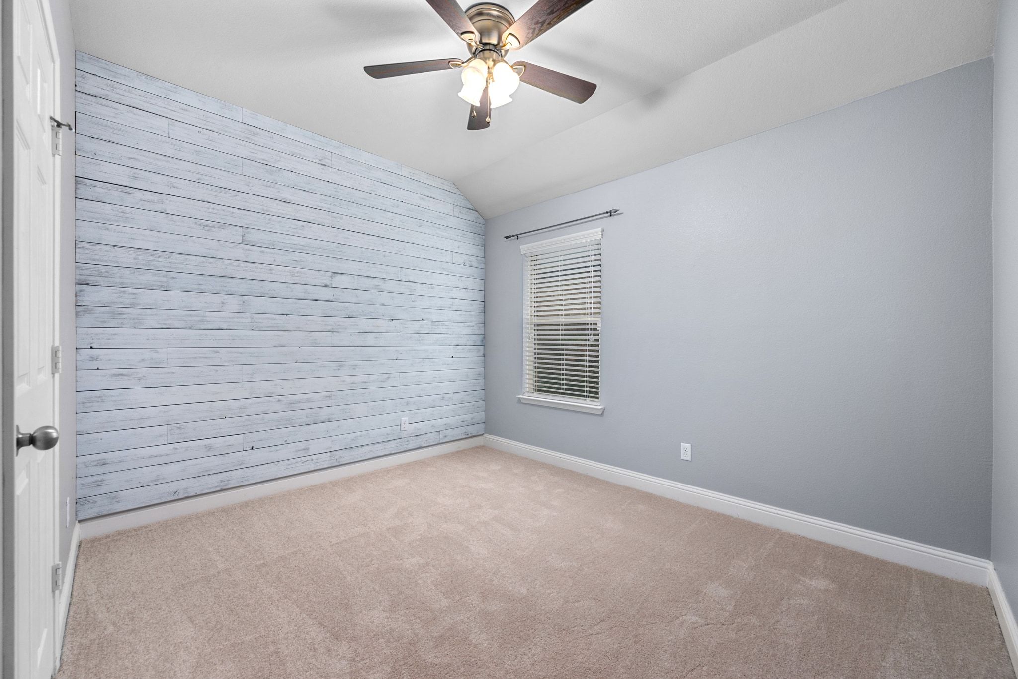 2041 Elaina Loop Leander, TX 78641 - Photo 18 of 25 an empty room with windows and fan