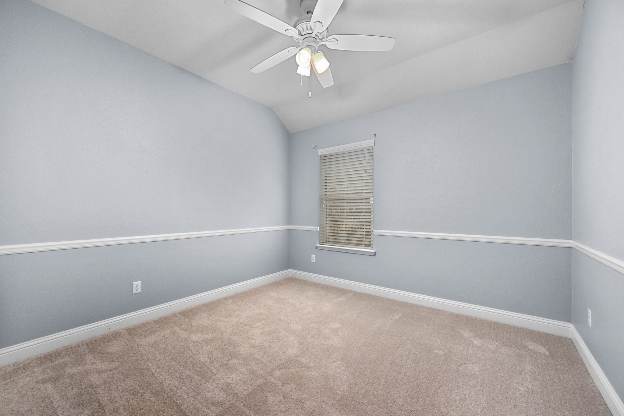 2041 Elaina Loop Leander, TX 78641 - Photo 20 of 25 an empty room with a window and a fan