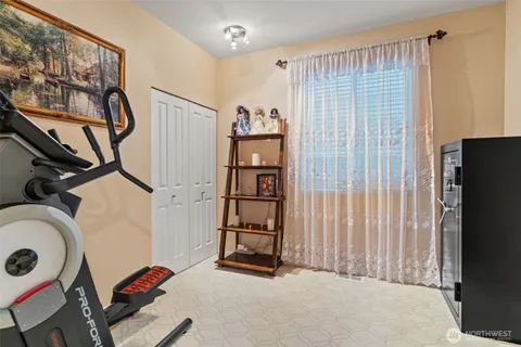 a view of livingroom with furniture and windows
