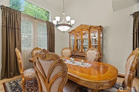 a view of a bedroom with furniture