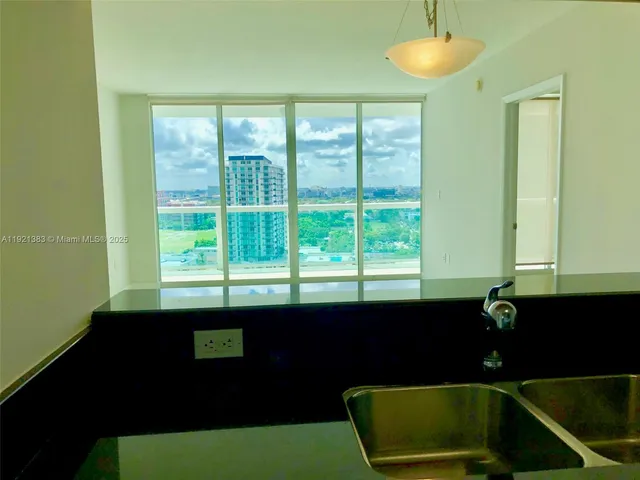 a room that has a sink and a window