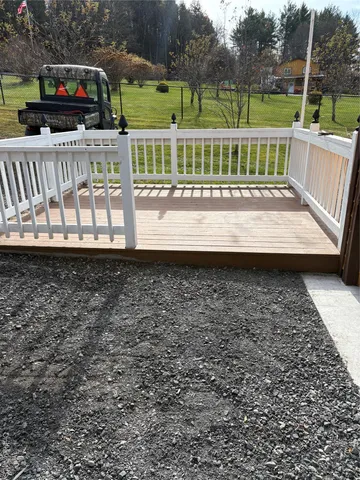 a view of a porch with a yard