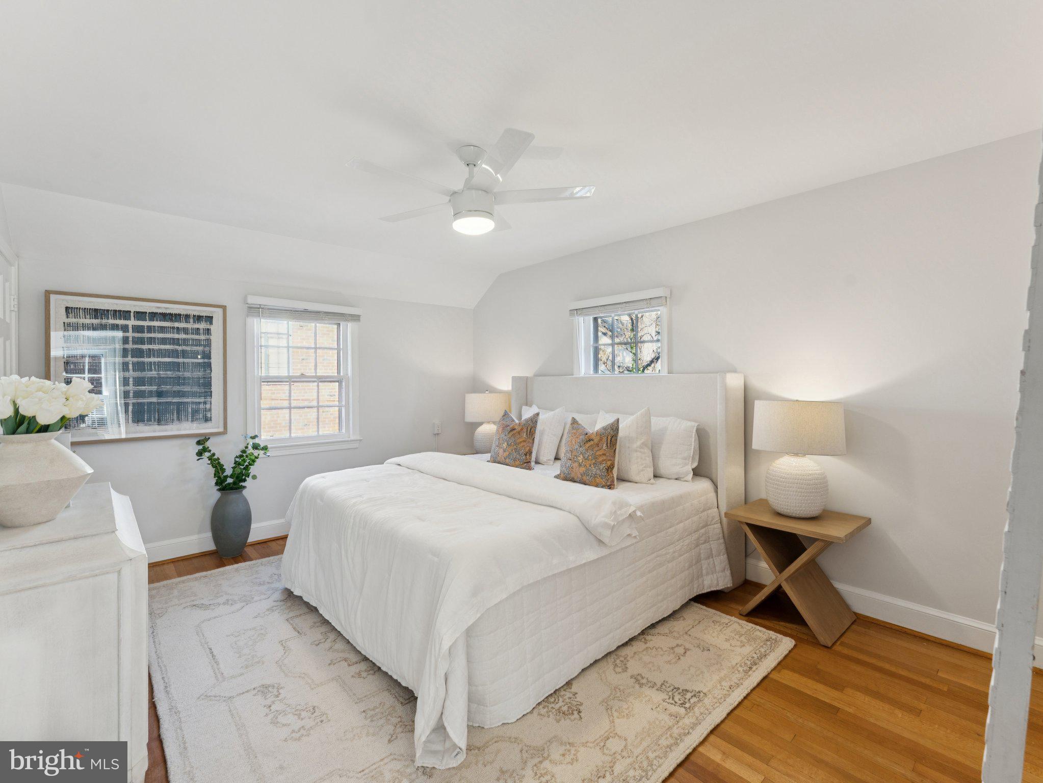 4821 45th Street Northwest Washington, DC 20016 - Photo 19 of 38 a bedroom with a large bed and a window
