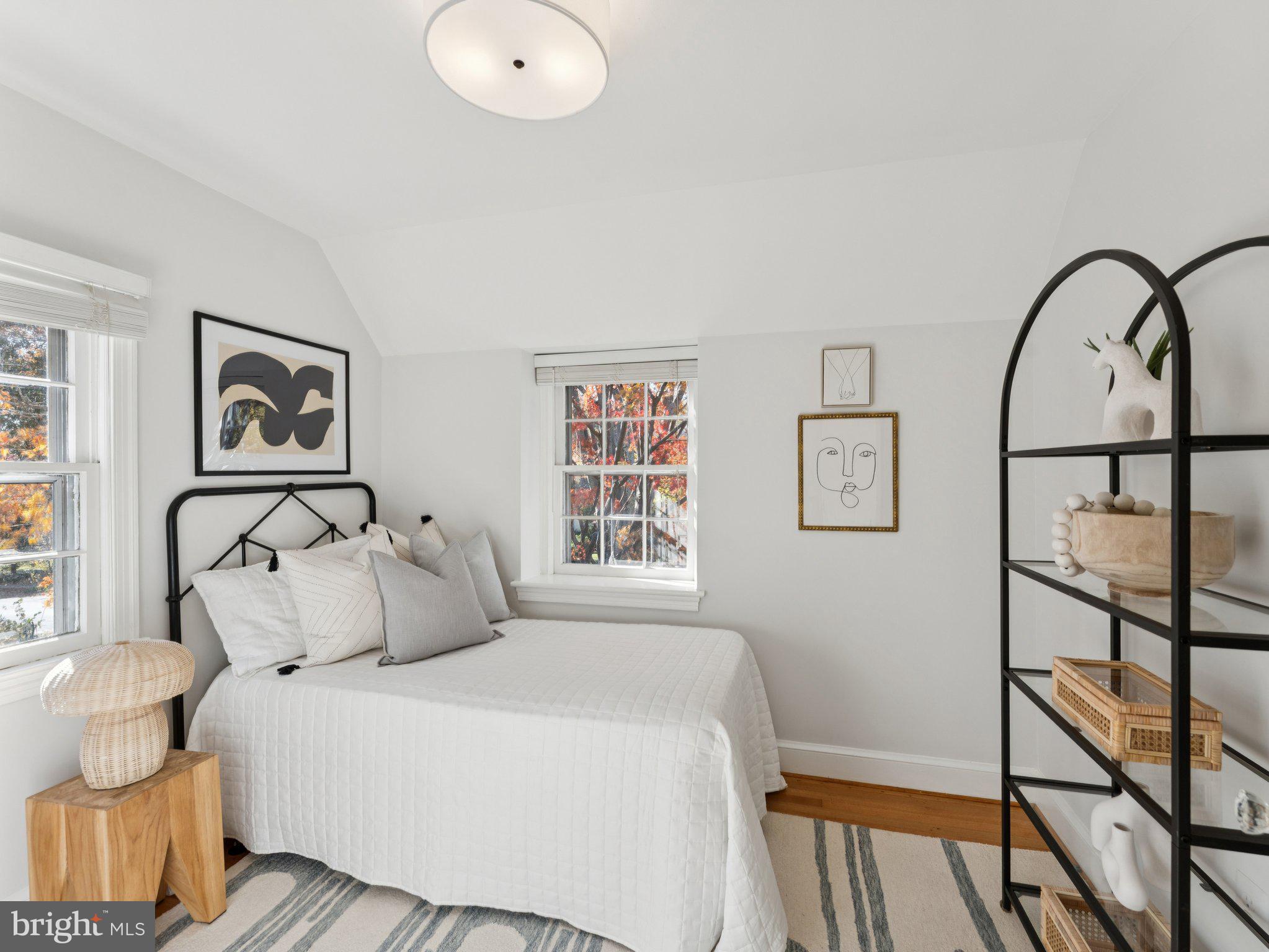 4821 45th Street Northwest Washington, DC 20016 - Photo 25 of 38 a bedroom with a bed and a large window