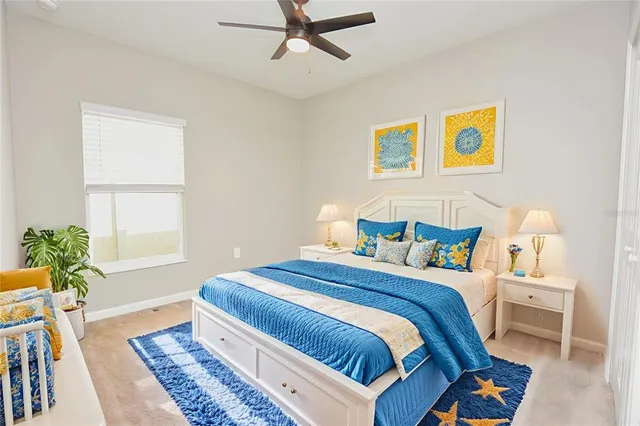 a bedroom with bed and a window