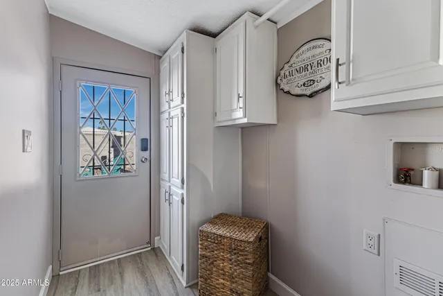 a view of room with front door